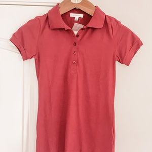 Burgundy shirt sleeve polo. Never worn.